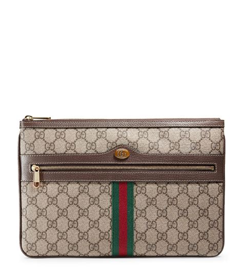 gucci gg supreme clutch bag|gucci ophidia suede.